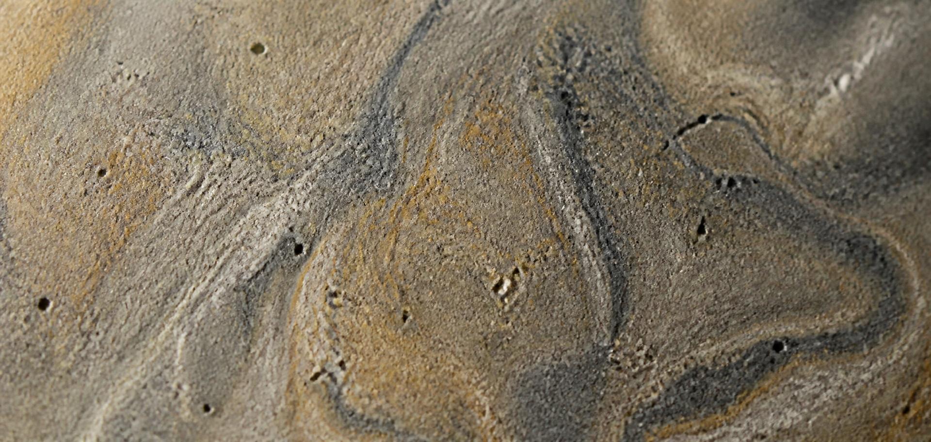 Macro detail of a pigmented cast composite surface